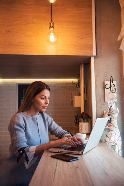 istock Female freelancer at cafe 1092621292