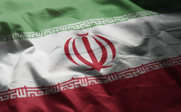 bandera de irán revuelta cerca - iranian flag fotografías e imágenes de stock