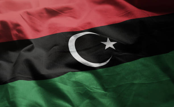 drapeau de la libye rumpled se bouchent - drapeau libyen photos et images de collection