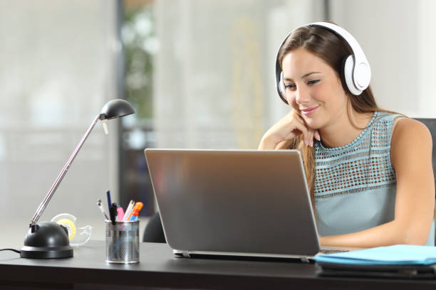 istock Girl learning watching online course on laptop 1092626710