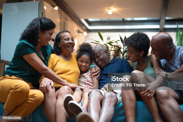 Multigeneration African Hispanic Family At Home Stock Photo - Download Image Now - Family, African-American Ethnicity, Multi-Generation Family