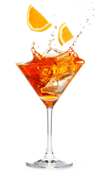 istock orange slices falling into a splashing cocktail 1092642172