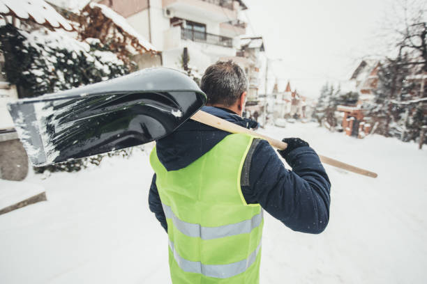 istock Mature guy going to clean snow with snow shovel 1092642796