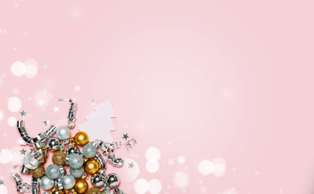 istock Christmas background with golden balls on pink background. 1092643036
