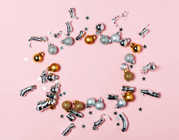 istock Christmas background with golden balls on pink background. 1092643066