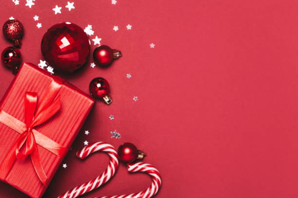 istock Red christmas Background with holiday decorations and Merry Christmas text. 1092643174