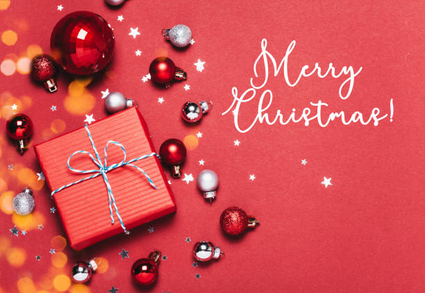 istock Red christmas Background with holiday decorations and Merry Christmas text. 1092643228