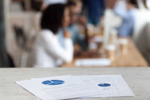 istock Document with financial report, pie diagram on office table 1092645702