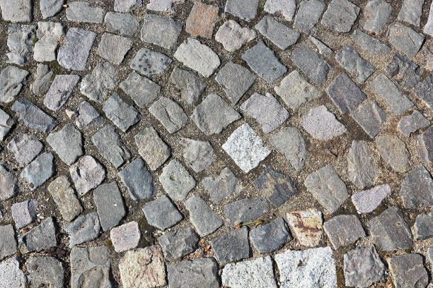 istock cubic stone pavement on the street 1092652010
