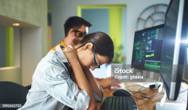 Exhausted By Office Work Stock Photo - Download Image Now - 30-39 Years, Neckache, Bad Posture