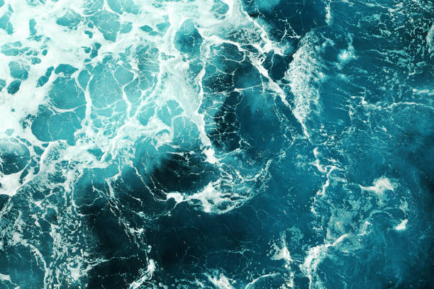 natural texture of agitated blue sea stock photo