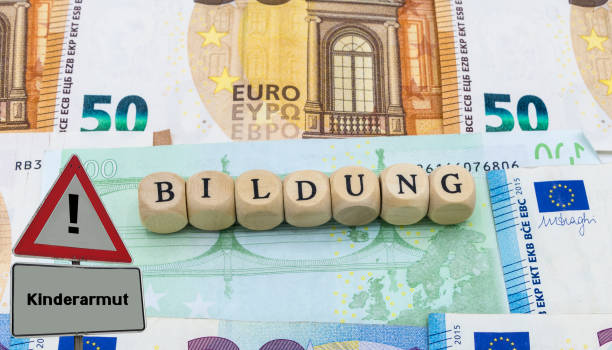 istock Sign Child Poverty Education german 