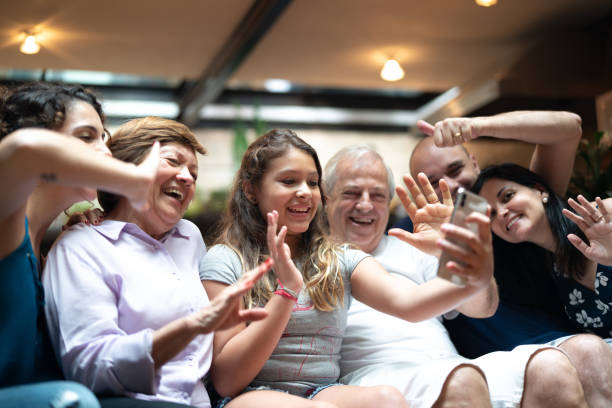 istock Multi-Generation hispanic-latino family having a video chat at home 1092664962