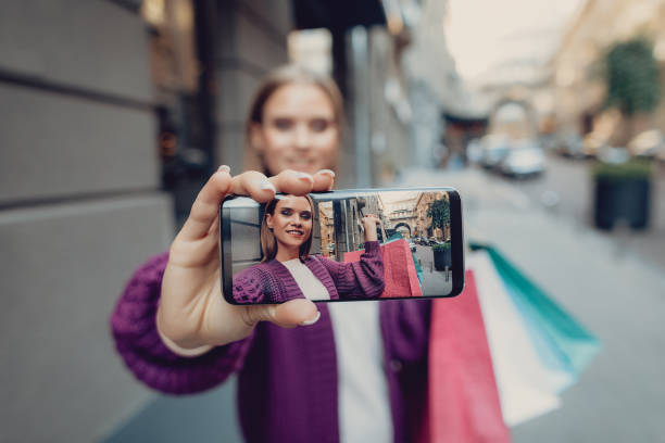 istock Charming young woman making selfie on the street 1092665936