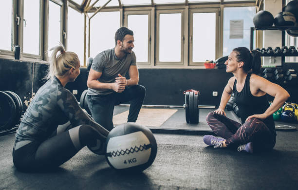 istock Friends taking a break after exercising in gym 1092668078