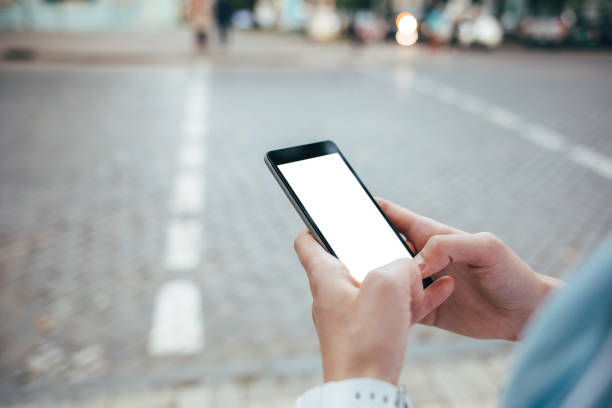 istock Woman's hands holding mobile phone 1092671500