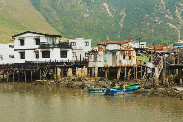 Tai O fishermen village with stilt houses in Hong Kong, China. Hong Kong, China - September 15, 2012: Tai O fishermen village with stilt houses in Hong Kong, China. Tai O is a famous tourist destination in Hong Kong. chinese slum stock pictures, royalty-free photos & images