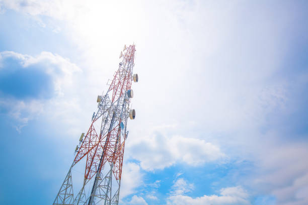 Large communication towers on a bright day stock photo