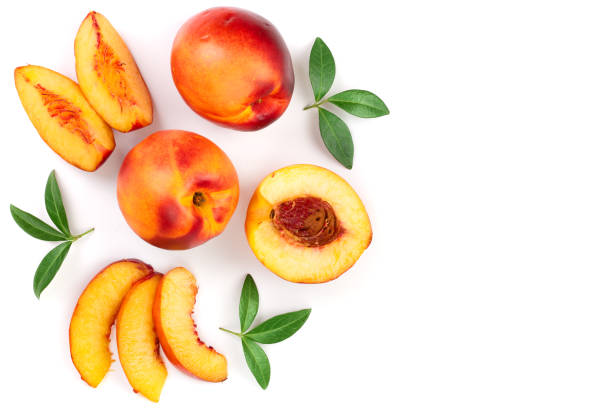 istock ripe nectarine with leaves isolated on white background with copy space for your text. Top view. Flat lay pattern 1092683172