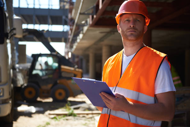 istock Serious foreman frowning and looking into the distance 1092688472
