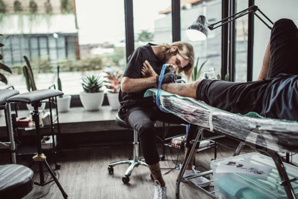 istock Busy day in tattoo studio 1092688712