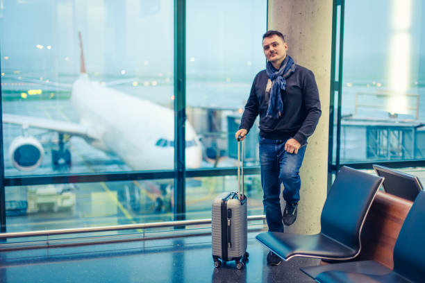 istock Passenger Waiting for His Flight at the Airport 1092689390