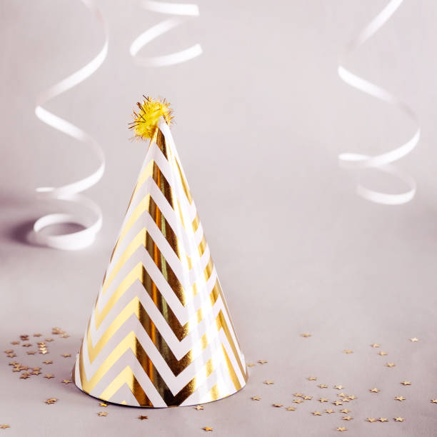 istock Golden striped cone hat. Golden Party Concept 1092699540