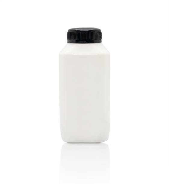 istock White blank plastic fresh milk bottle with black cap isolated on white background 1092705778