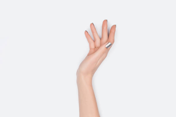 istock cropped view of female hand isolated on white 1092706704