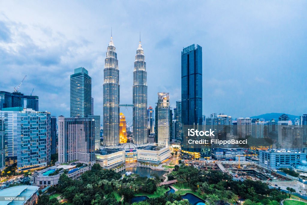 Kuala Lumpur Skyline with Petronas Towers at sunset Malaysia Stock Photo