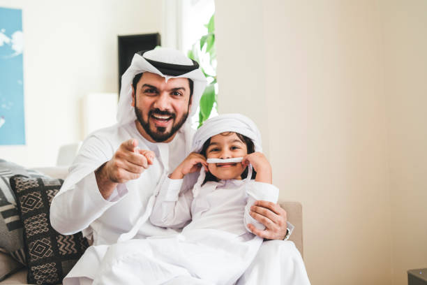 istock Arab dad and son portrait at home 1092713336