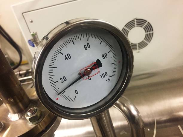 istock Analog temperature meter at an industrial facility 1092719804