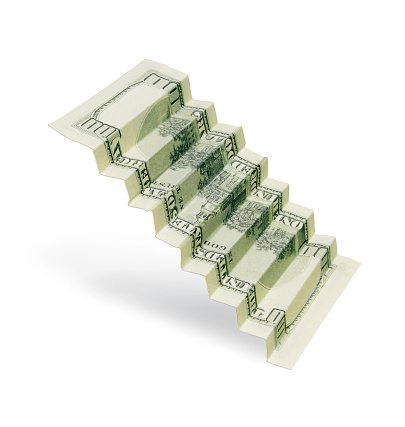 The denomination of 100 US dollars is folded in the form of a ladder.  Isolated on white background. 3D render