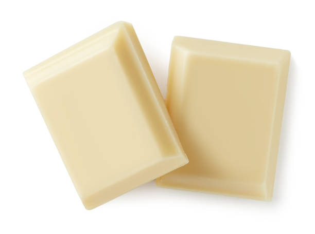 istock White chocolate pieces isolated on white background 1092727852