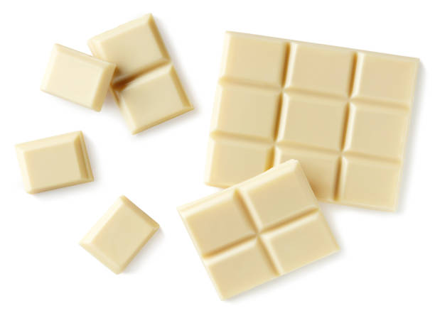 istock White chocolate pieces isolated on white background 1092727948