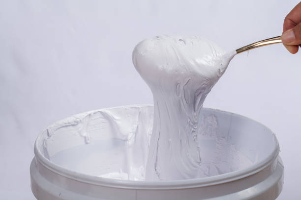 istock scoop the white ink out the barrel 1092731634
