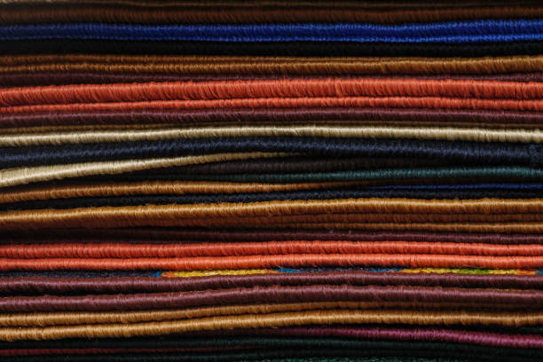 istock Assorted multicolored soft mats lying in one pile in modern shop 1092740002
