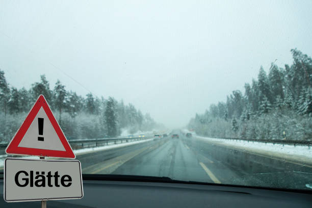Highway Motorway Sign Slipperiness german "Glätte" stock photo