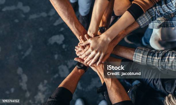 Symbol Of Teamwork Cooperation And Unity Stock Photo - Download Image Now - Teamwork, People, Togetherness