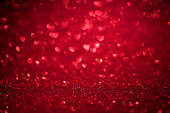 St. Valentine's Day red bokeh background with love heart, place for text
