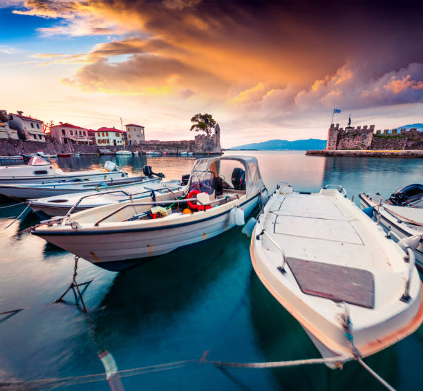 colorful spring view of the nafpaktos port. fantastic sunrise in the gulf of corinth, greece, europe. beauty of countryside concept background. - gulf of corinth imagens e fotografias de stock