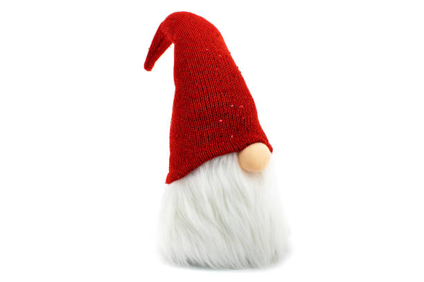 istock Gnome a Christmas elf wearing big red with glitters hat and standing on white background 1092752846
