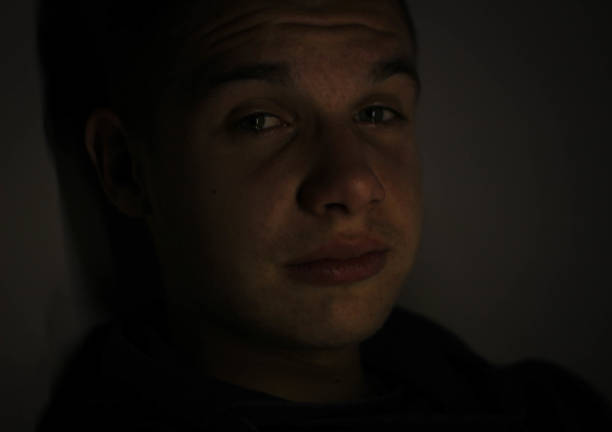 istock sad boy with tears in his eyes 1092753928