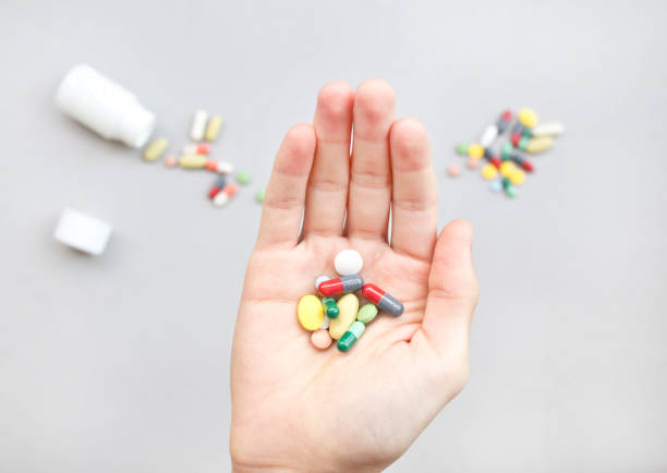 istock Colorful pills and medicines in the hand 1092756056