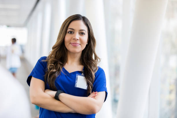 istock Confident young Hispanic female nurse 1092758492