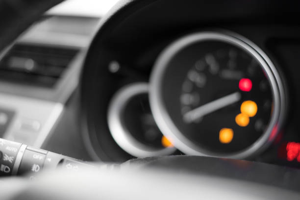 Vehicle dashboard - car breakdown - traction control light on - DSC light on - ESP light on - ABS light on Vehicle dashboard - car breakdown - traction control light on - DSC light on - ESP light on - ABS light on dashboard close up speedometer odometer stock pictures, royalty-free photos & images