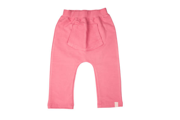 istock Pink Color baby's trousers isolated on a white background 1092771326