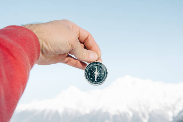 istock With compass in the snowy mountains. 1092775974