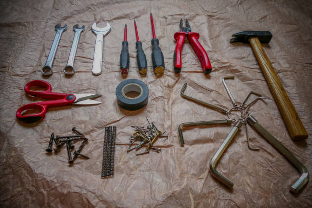 istock Useful set of working tools on light background. Industrial concept 1092776674