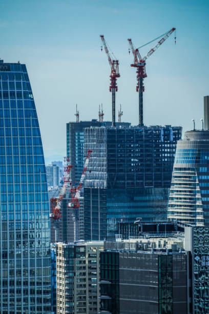 istock Building under construction and the Tokyo skyline 1092793748